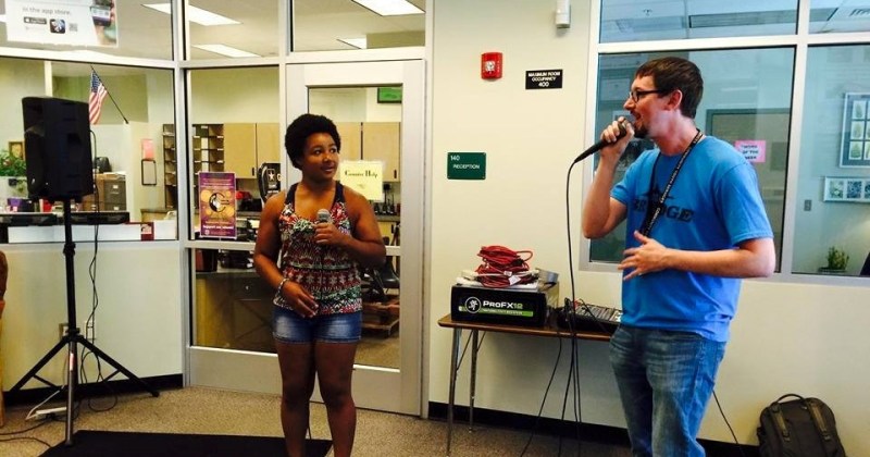 Jubilation Fellow Bobby Williams rapping with a student