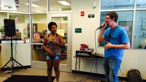 Jubilation Fellow Bobby Williams rapping with a student